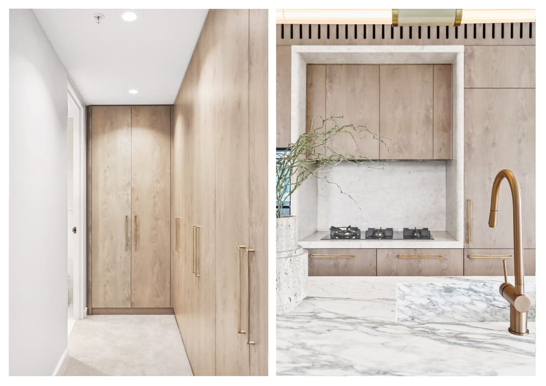 Hallway and kitchen with timber joinery and marble benchtops