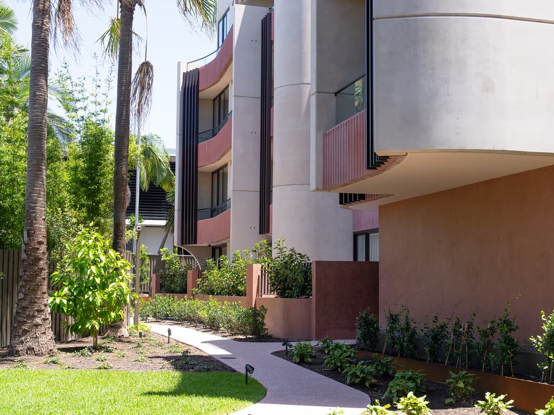 Modern apartment building with professional landscaping