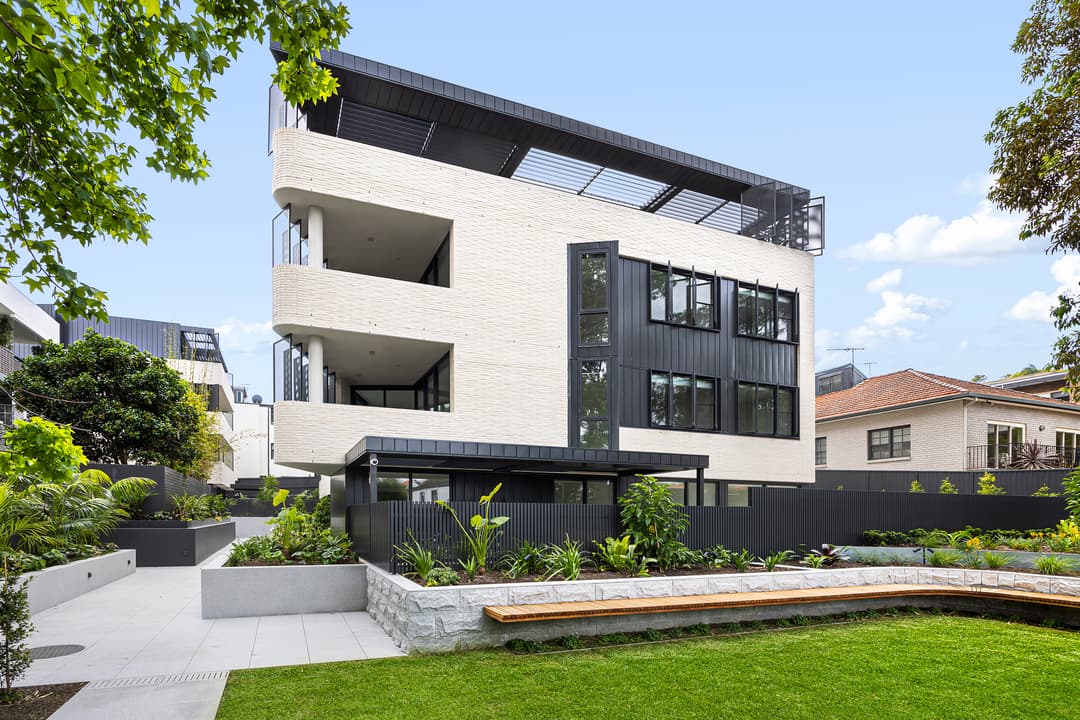 Architectural home with landscaped garden and timber screens