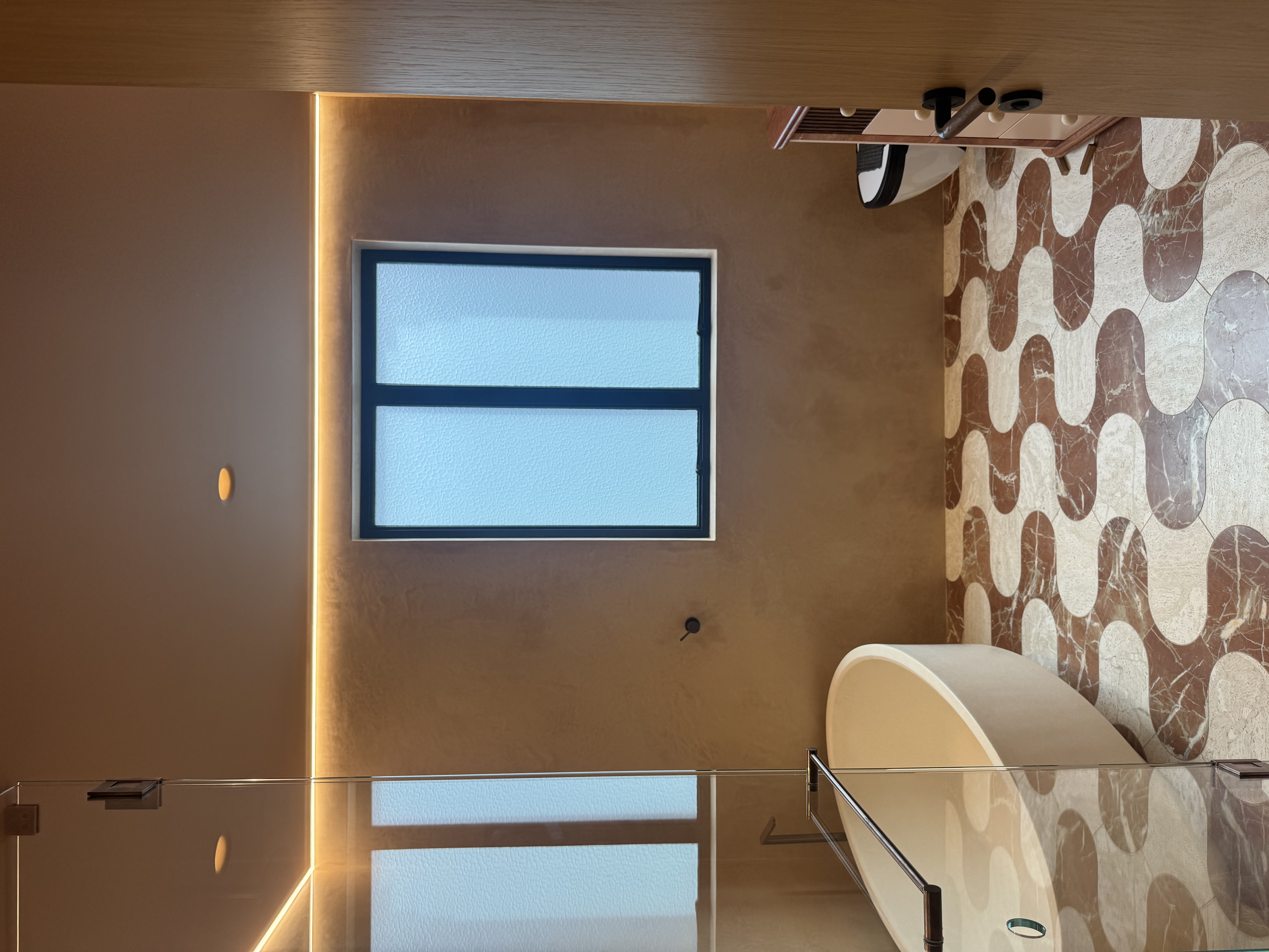 Professional bathroom window caulking and sealing work in Mosman luxury home